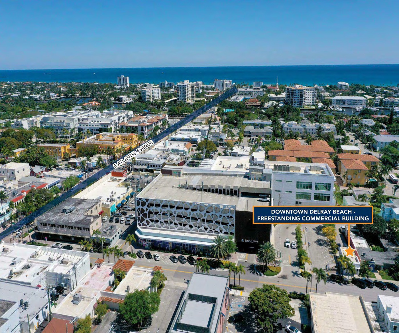 Aerial of 75 SE 4th Avenue, half a block off Atlantic Avenue toward the ocean in downtown Delray Beach