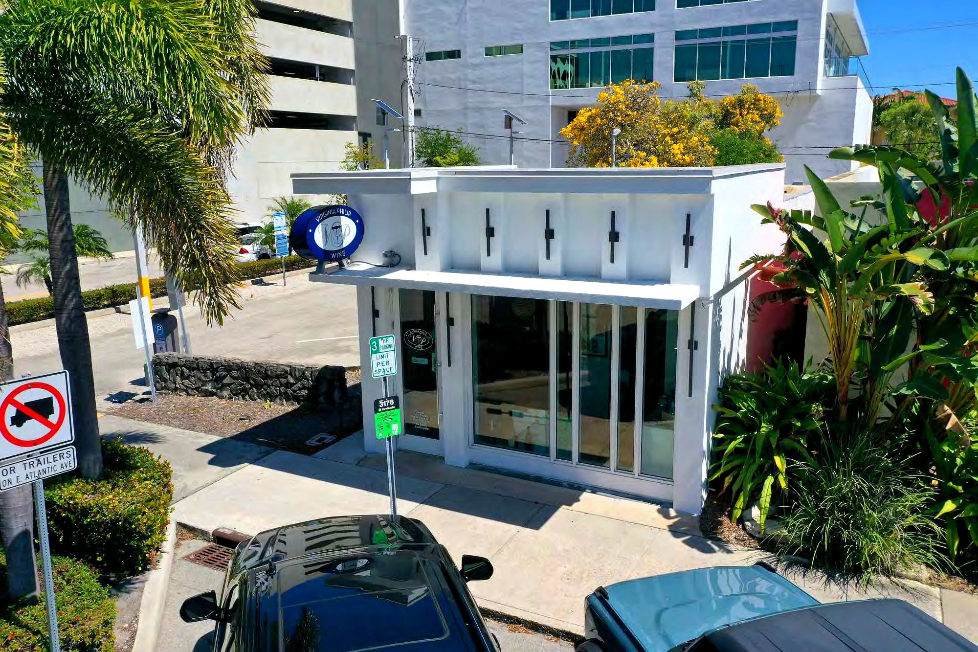 75 SE 4th Avenue freestanding building by day, next to the public parking garage